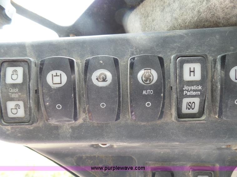 image for item L1579 2010 John Deere 333D skid steer