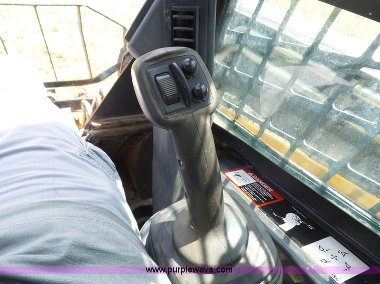 image for item L1579 2010 John Deere 333D skid steer