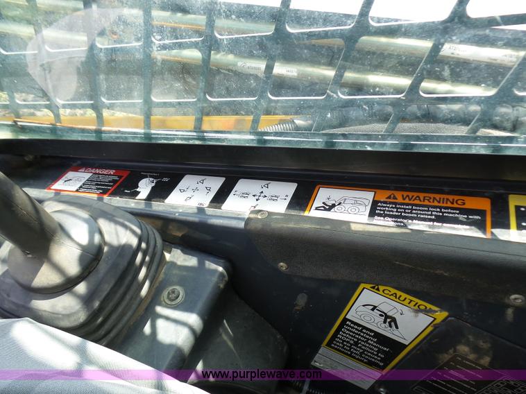 image for item L1579 2010 John Deere 333D skid steer