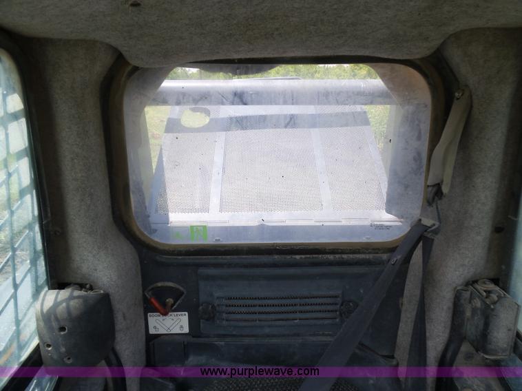 image for item L1579 2010 John Deere 333D skid steer