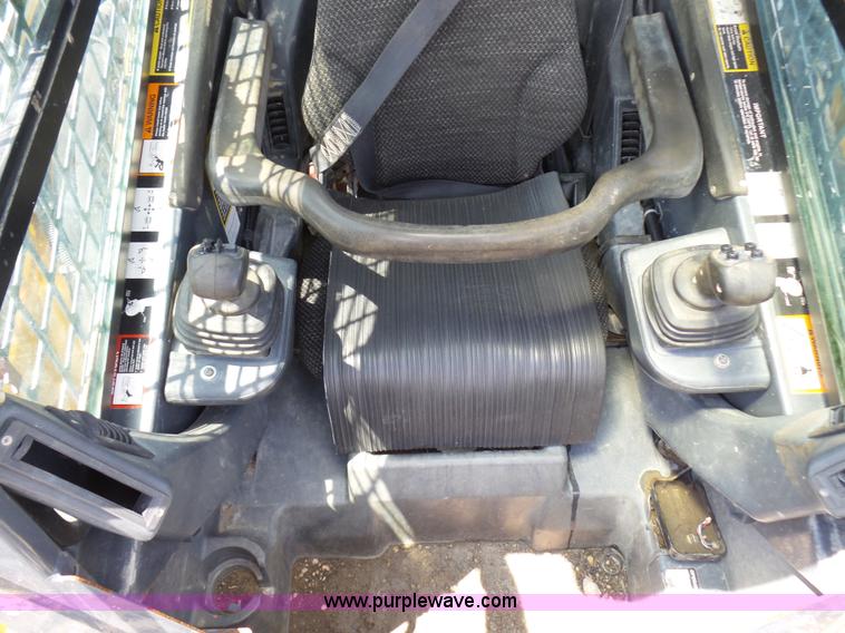 image for item L1579 2010 John Deere 333D skid steer