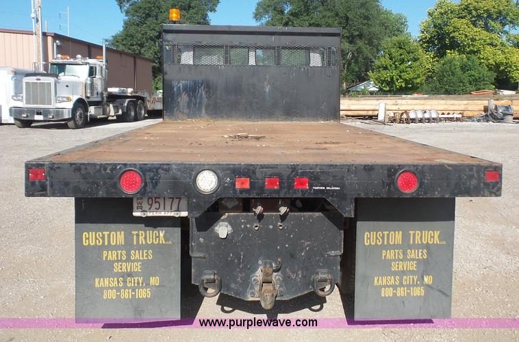 image for item L4934 1995 Freightliner FL70 flatbed truck