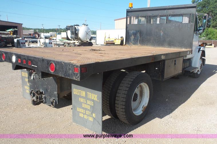 image for item L4934 1995 Freightliner FL70 flatbed truck