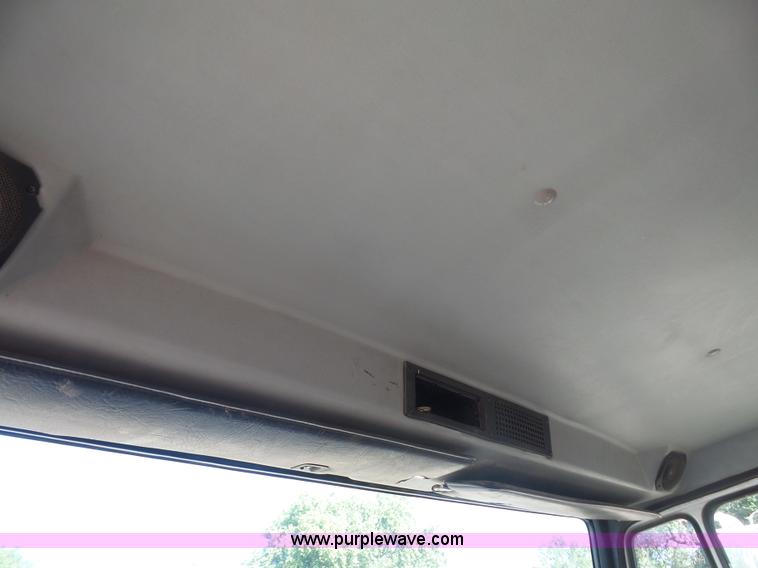 image for item L4934 1995 Freightliner FL70 flatbed truck