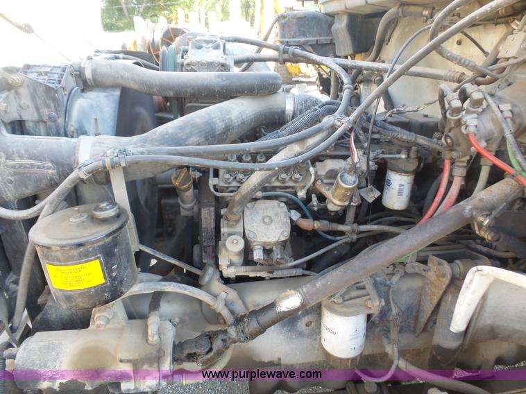 image for item L4934 1995 Freightliner FL70 flatbed truck