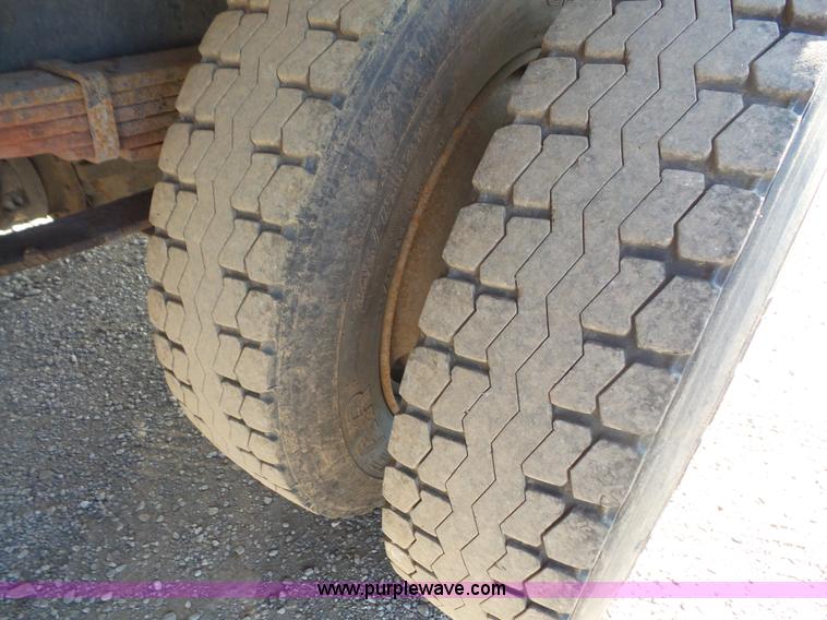 image for item L4934 1995 Freightliner FL70 flatbed truck