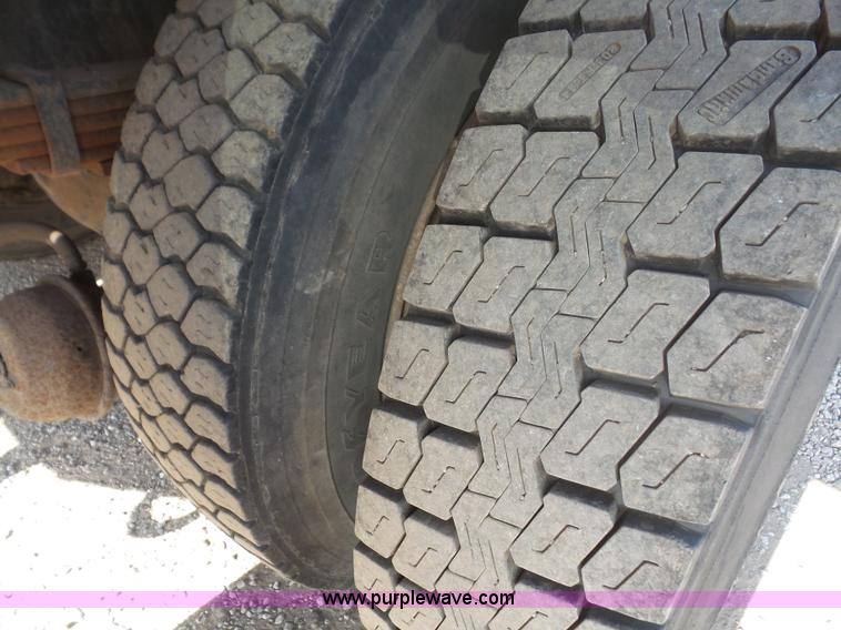 image for item L4934 1995 Freightliner FL70 flatbed truck