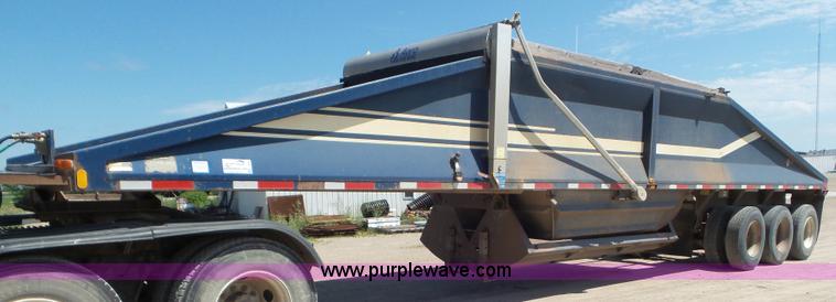 image for item L6856 1987 Midland bottom dump trailer