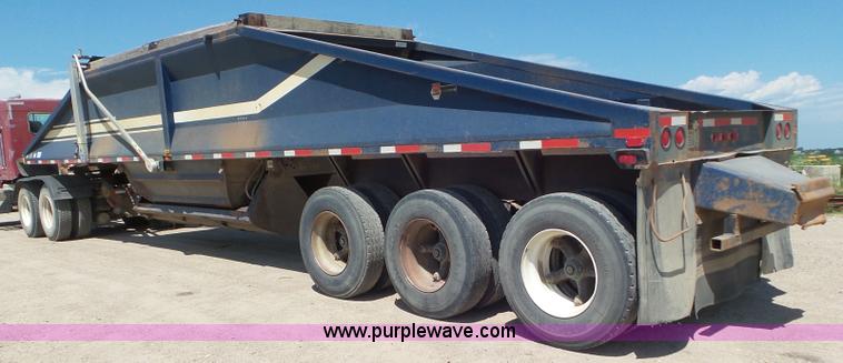 image for item L6856 1987 Midland bottom dump trailer