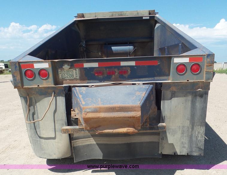 image for item L6856 1987 Midland bottom dump trailer
