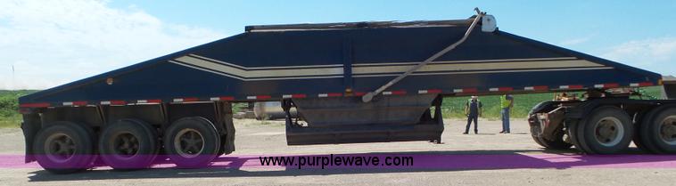 image for item L6856 1987 Midland bottom dump trailer