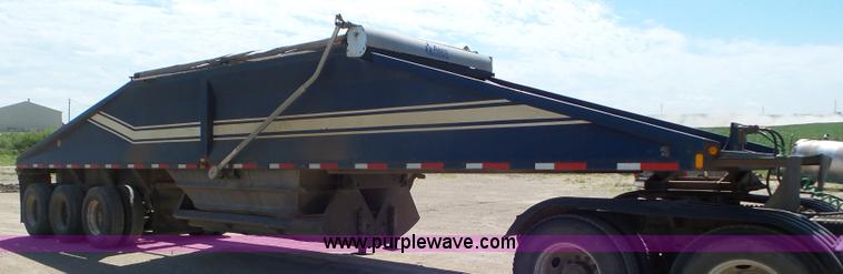 image for item L6856 1987 Midland bottom dump trailer