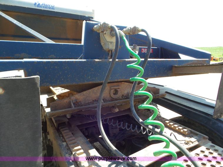 image for item L6856 1987 Midland bottom dump trailer