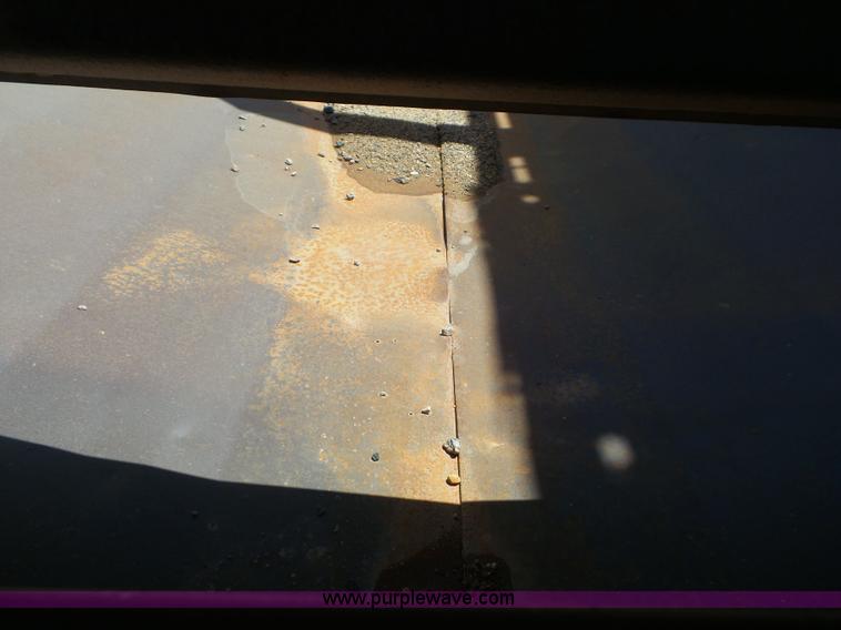 image for item L6856 1987 Midland bottom dump trailer