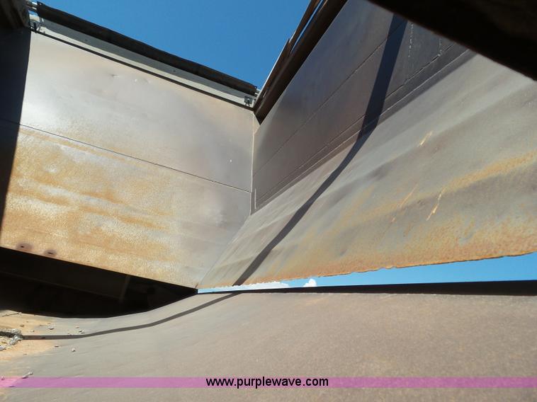 image for item L6856 1987 Midland bottom dump trailer