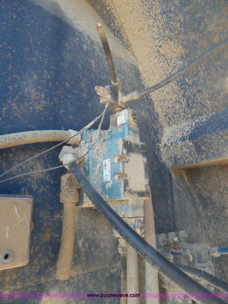 image for item L6856 1987 Midland bottom dump trailer