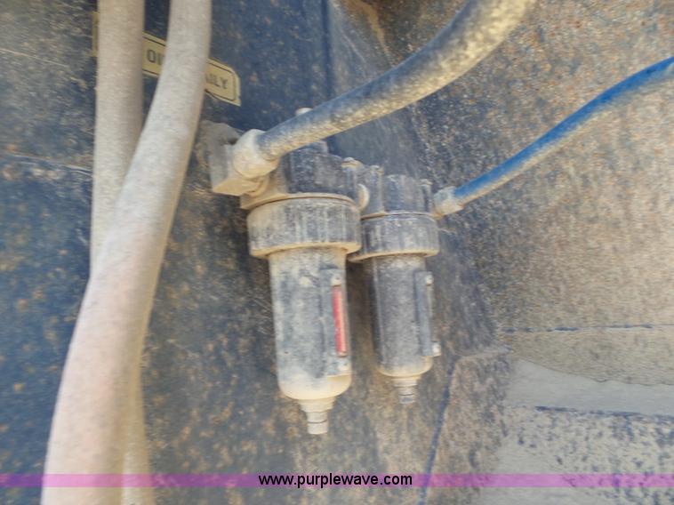 image for item L6856 1987 Midland bottom dump trailer