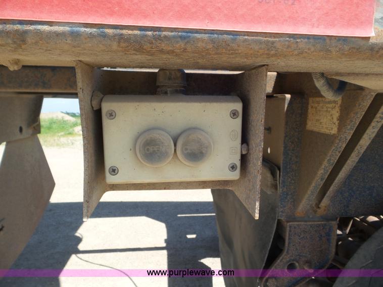 image for item L6856 1987 Midland bottom dump trailer