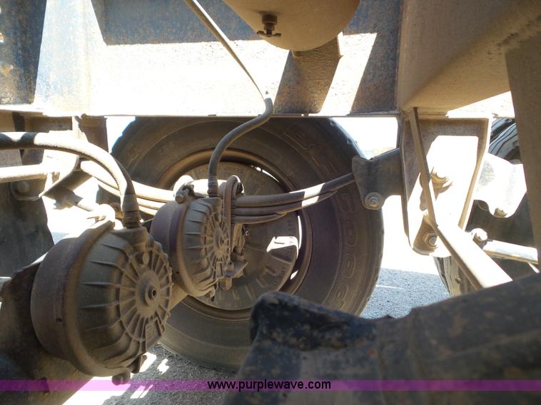 image for item L6856 1987 Midland bottom dump trailer