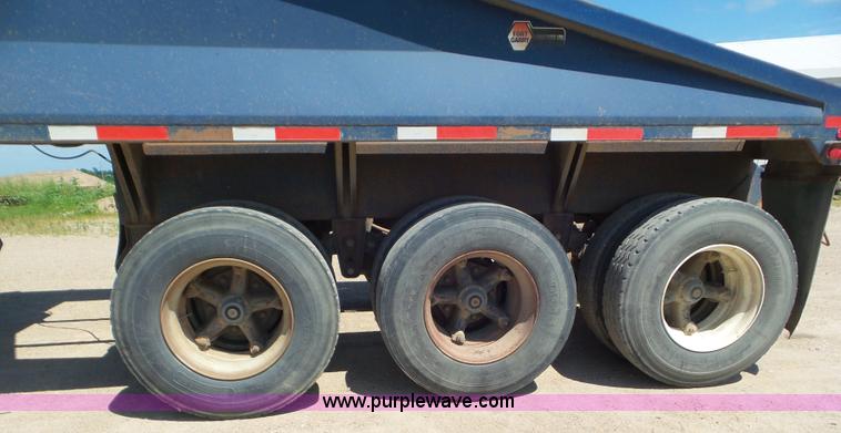 image for item L6856 1987 Midland bottom dump trailer