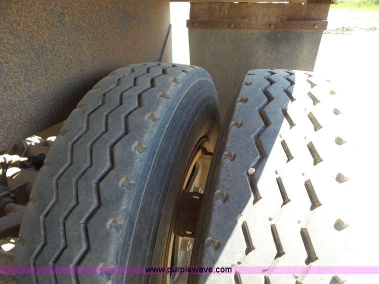 image for item L6856 1987 Midland bottom dump trailer