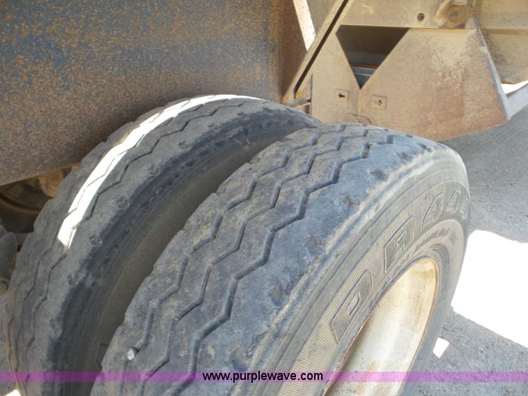 image for item L6856 1987 Midland bottom dump trailer