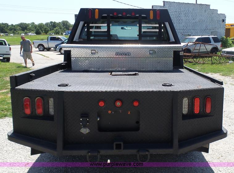 image for item L7112 2008 Ford F350 Super Duty Crew Cab flatbed pickup truck