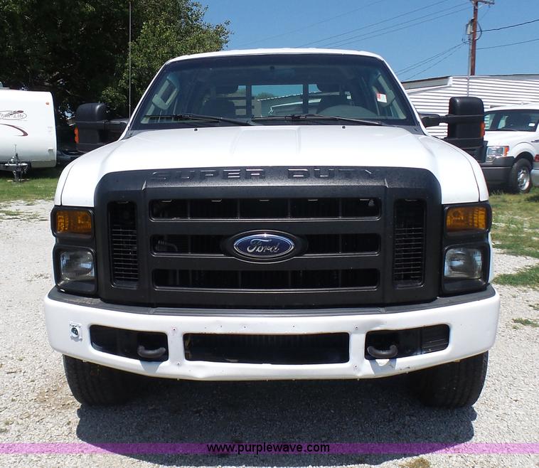 image for item L7112 2008 Ford F350 Super Duty Crew Cab flatbed pickup truck
