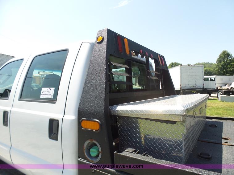 image for item L7112 2008 Ford F350 Super Duty Crew Cab flatbed pickup truck