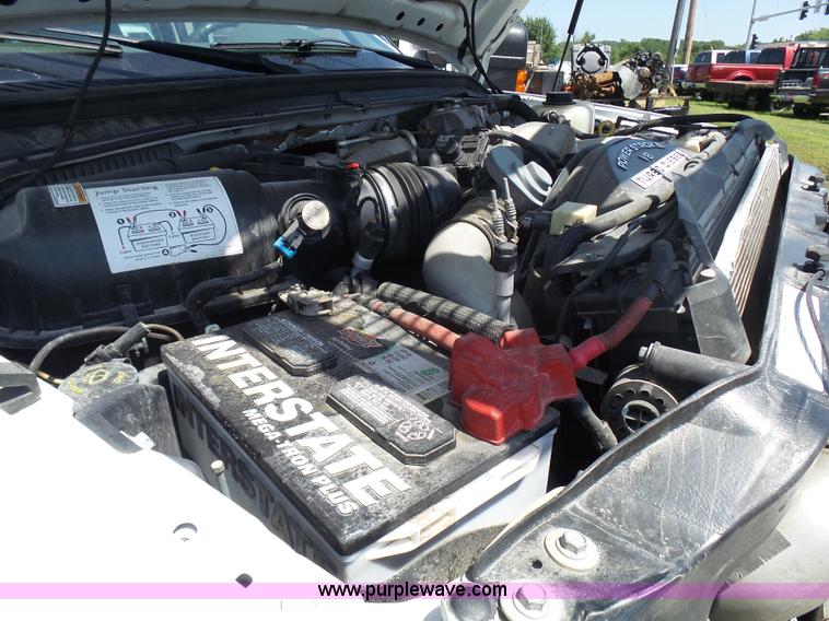 image for item L7112 2008 Ford F350 Super Duty Crew Cab flatbed pickup truck