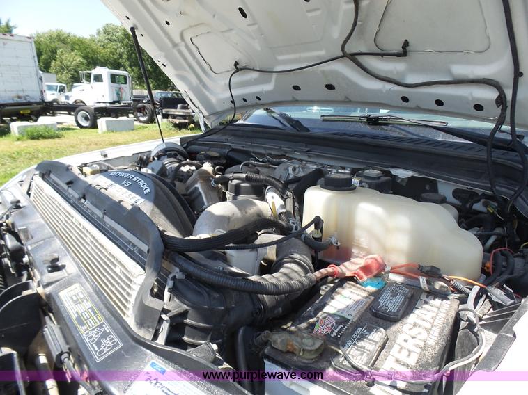 image for item L7112 2008 Ford F350 Super Duty Crew Cab flatbed pickup truck