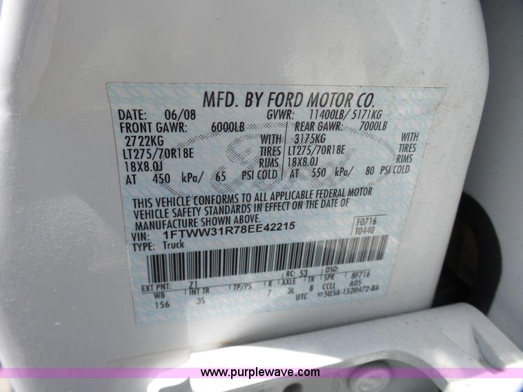 image for item L7112 2008 Ford F350 Super Duty Crew Cab flatbed pickup truck