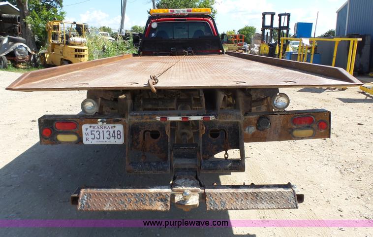 image for item BR9116 1999 Ford F550 rollback truck