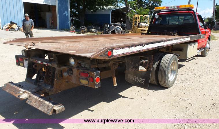 image for item BR9116 1999 Ford F550 rollback truck