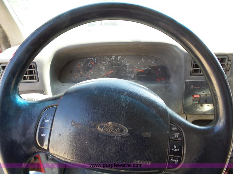 image for item BR9116 1999 Ford F550 rollback truck