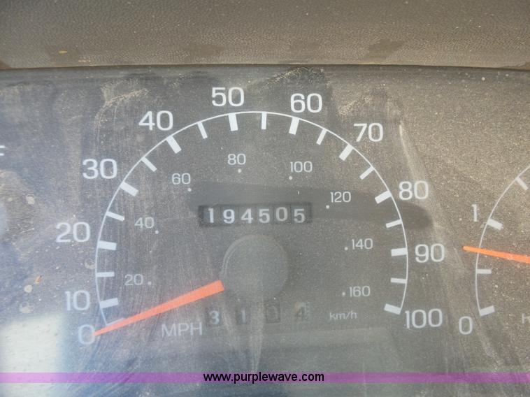 image for item BR9116 1999 Ford F550 rollback truck