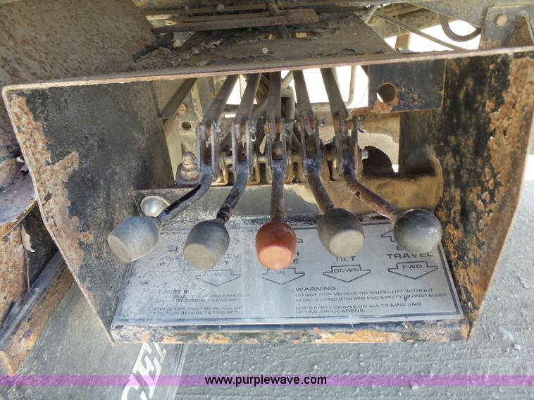 image for item BR9116 1999 Ford F550 rollback truck