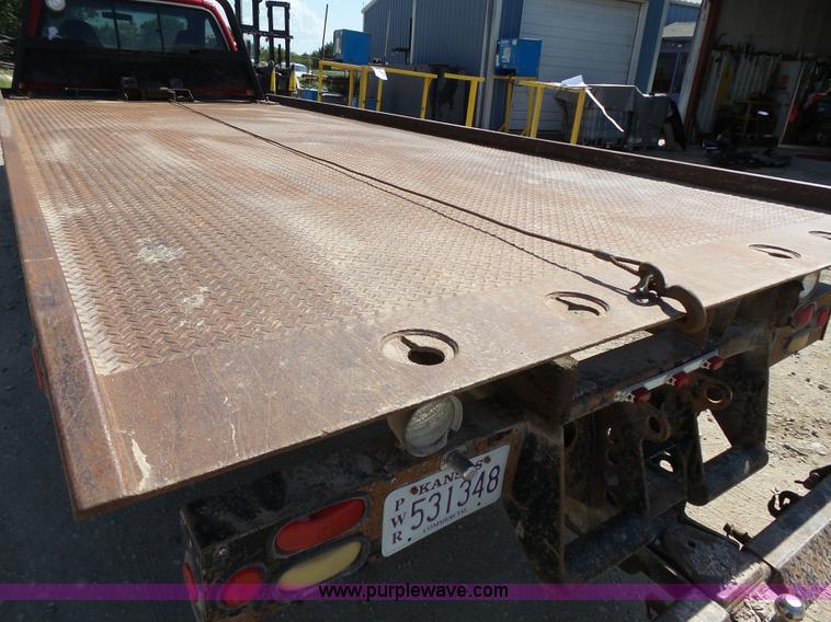 image for item BR9116 1999 Ford F550 rollback truck