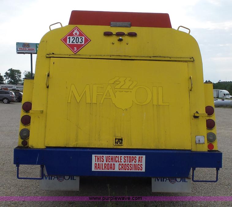 image for item K1169 1999 Freightliner FL70 fuel truck