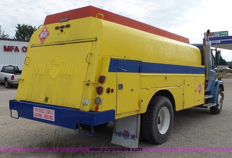 image for item K1169 1999 Freightliner FL70 fuel truck