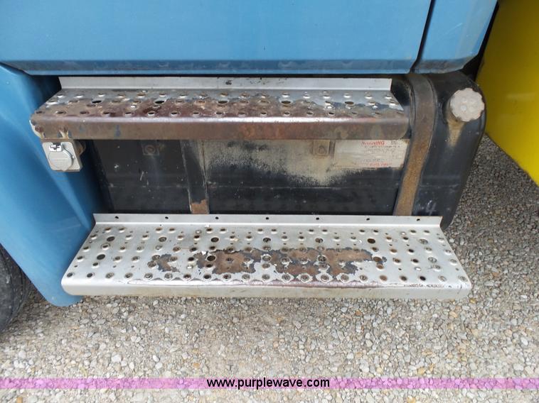 image for item K1169 1999 Freightliner FL70 fuel truck