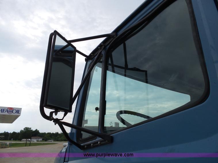 image for item K1169 1999 Freightliner FL70 fuel truck