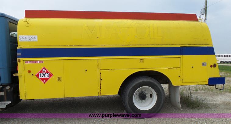 image for item K1169 1999 Freightliner FL70 fuel truck