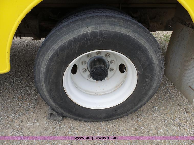 image for item K1169 1999 Freightliner FL70 fuel truck