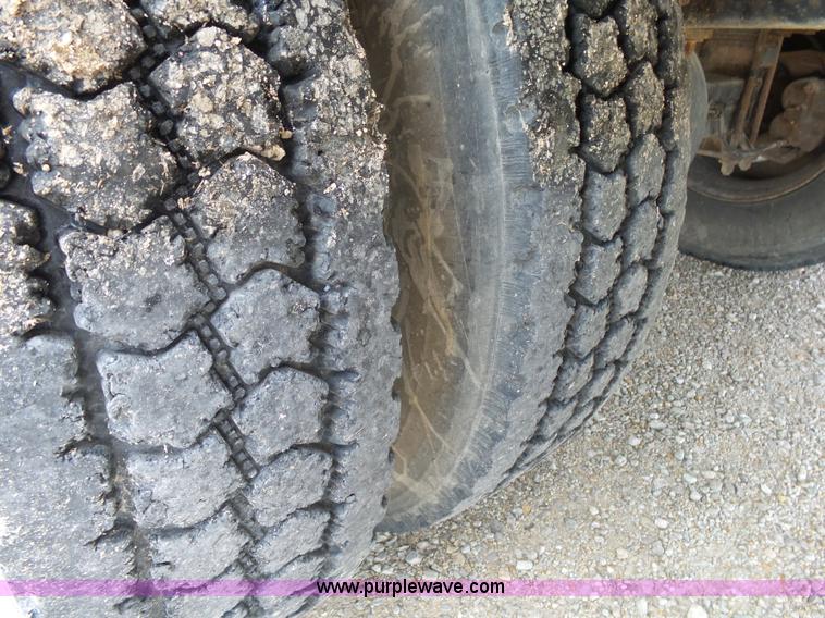 image for item K1169 1999 Freightliner FL70 fuel truck