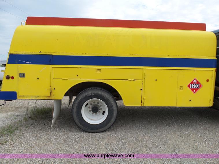 image for item K1169 1999 Freightliner FL70 fuel truck