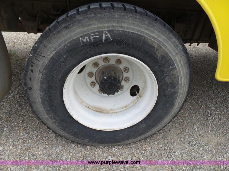 image for item K1169 1999 Freightliner FL70 fuel truck