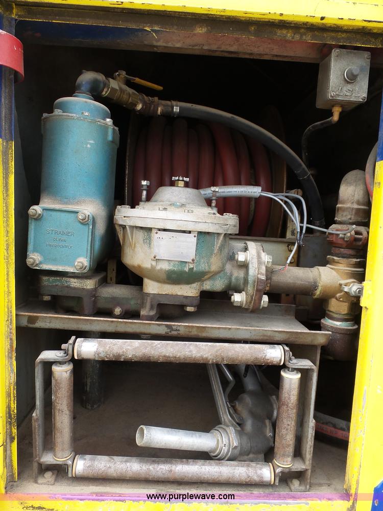 image for item K1169 1999 Freightliner FL70 fuel truck