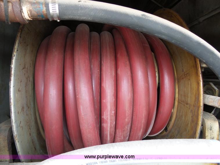 image for item K1169 1999 Freightliner FL70 fuel truck