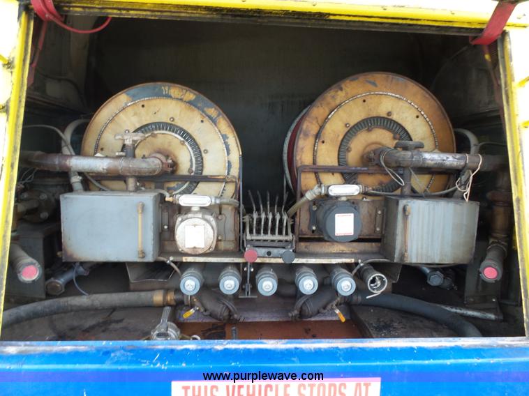 image for item K1169 1999 Freightliner FL70 fuel truck